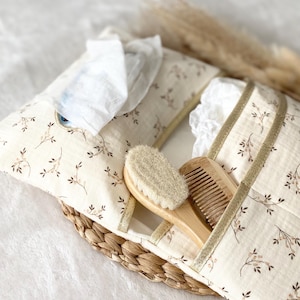 Changing bag for storing diapers and baby wipes in customizable cotton gauze