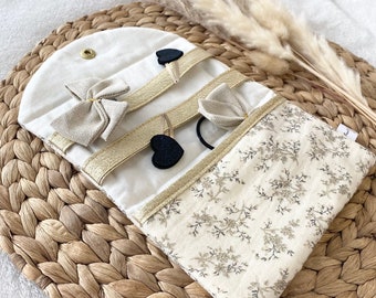 Pouch with barrettes and elastics in double cotton gauze