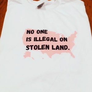 No one is illegal on stolen land T-Shirt