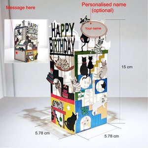 以下が含まれることがあります： 猫をテーマにした誕生日デザインのカラフルな3Dポップアップカード。カードの幅は5.78cm、高さは15cmです。カードには「ハッピーバースデー」の文字と、名前を記入できるスペースがあります。