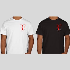 May include: Two short-sleeved t-shirts, one white and one black. Each shirt features a red logo on the upper left chest. The logo appears to be the initials "RF" with a stylized design underneath. The shirts are plain and simple.