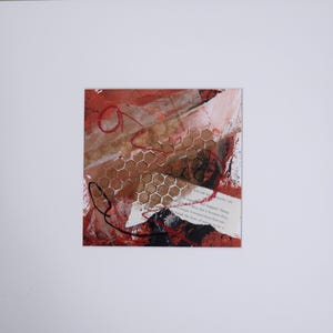 A mixed media mono-print with collage elements and mark making, matted and ready to frame.