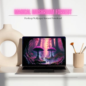 May include: A laptop computer displaying a digital illustration of a magical forest with two large pink mushrooms and a stream of water flowing through the center. The text "MAGICAL MUSHROOM FORREST" is displayed in pink neon letters above the image. The text "Desktop Wallpaper Instant Download" is displayed below the image.