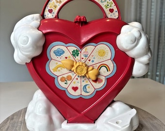 Estuche Kenner con base en forma de corazón de los Osos Cariñositos, vintage de 1983