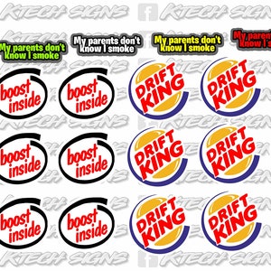 May include: A sheet of yellow, black and white stickers with various designs. The stickers feature phrases like "Tarmac Terrorist", "Drift King", "Boost Inside", "Burn Rubber", "Eat Sleep Drift", and "Just Drift".