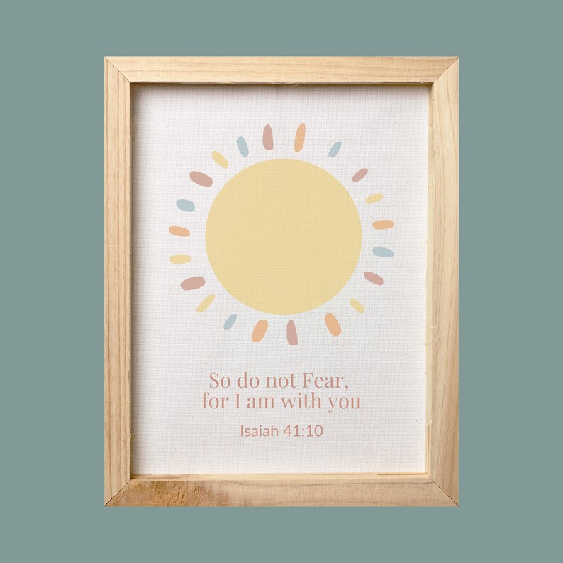 May include: A framed print with a yellow sun graphic and the text "So do not Fear, for I am with you Isaiah 41:10".