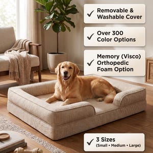May include: A rectangular beige dog bed with raised bolster sides, featuring a golden retriever resting on it. Text overlays state: Removable & Washable Cover, Over 300 Color Options, Memory (Visco) Orthopedic Foam Option, and 3 Sizes (Small • Medium • Large).