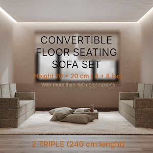 May include: A convertible floor seating sofa set with two triple sofas, each 240 cm in length. The set has a height of 20 + 20 cm (8 + 8 inches) and offers over 100 colour options. The image shows the sofa set in a room setting.