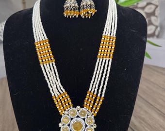 Beautiful kundan polki set with semiprecious pearls and yellow beads