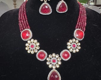 Vibrant Polki Kundan necklace set in Ruby color