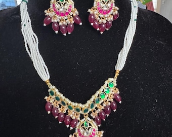 Beautiful Jadau Pachi kundan set with semiprecious pearls and ruby beads