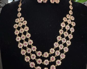 Royal looking Layered Necklace set with semiprecious white and pink color Ad stones in gold finish