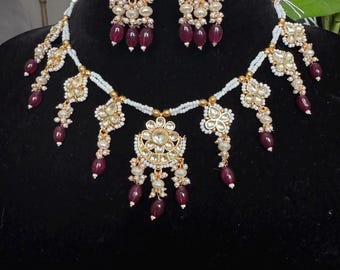 Beautiful Jadau Pachi kundan set with semiprecious pearls and ruby beads