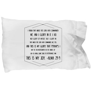 May include: White pillow with black text that reads "I know that which the Lord hath commanded me, and I glory in it. I do not glory of myself, but I glory in that which the Lord hath commanded me, yea. And this is my glory, that perhaps I may be an instrument in the hands of God to bring some soul to repentance, and this is my joy. -Alma 29:9"
