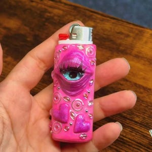 pink eyeball lighter case with rhinestones