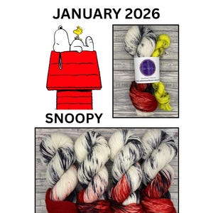 May include: Image features Snoopy on his red doghouse with the text "JANUARY 2026" and "SNOOPY". The image also shows skeins of hand-dyed yarn in white, black, red, and yellow. The yarn is arranged in a bundle.