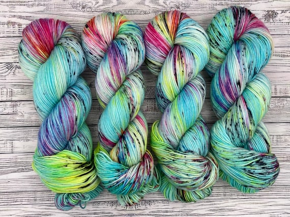 Fun In The Sun - June Color of the Month - Hand Dyed Yarn - Knit Crochet Gift - Superwash Merino - Blue Yellow Pink Black Rainbow Yarn