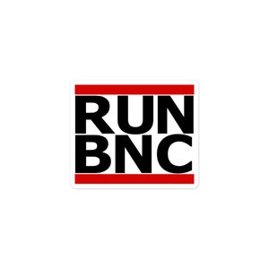 May include: A white sticker with a red border and black text that reads "RUN BNC".