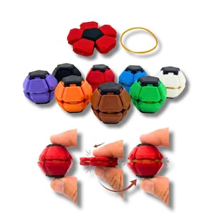 Könnte beinhalten: Eine Sammlung mehrfarbiger geometrischer Fidget-Kugeln in Lila, Schwarz, Orange, Rot, Braun, Blau, Grün und Weiß. Eine rote Kugel ist flach mit einem gelben Gummiband dargestellt, und Diagramme veranschaulichen den Transformationsprozess.