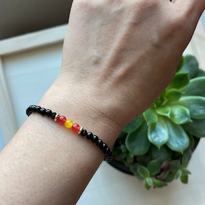 Spain Flag Gemstone Bracelet: Red, Yellow, Black Onyx Beaded Bracelet