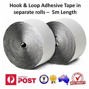 May include: Two rolls of white hook and loop adhesive tape, each 5 metres long. The tape is rolled up and has a black adhesive side. The rolls are on a white background.