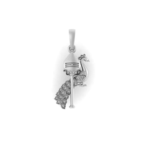 May include: A silver pendant featuring a peacock design. The pendant has a detailed peacock with a long tail, perched on a spear-like structure. The top of the pendant has a loop for a chain.