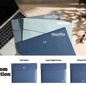 May include: A selection of personalised laptop sleeves in shades of blue, such as Gery-Blue, Sky Blue, and Navy Blue. Each sleeve has a flap closure and is embossed with initials. The phrase "Custom Location" is displayed.