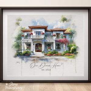 May include: Watercolour painting of a grand white house with a red tiled roof, set amongst vibrant greenery and flowers. The text "Our Dream Home est. 2023" is written in cursive below the house. The artwork is framed in a black frame.