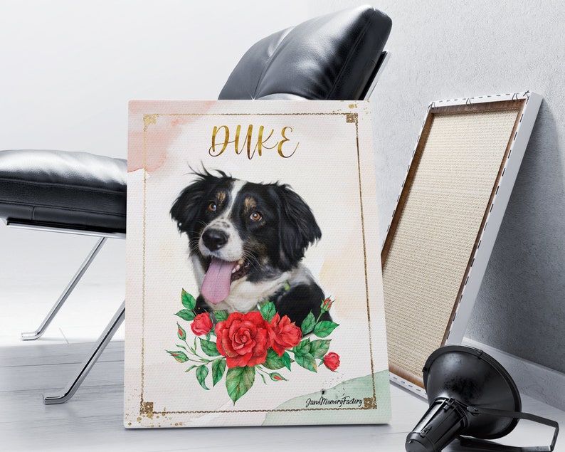 May include: A white canvas print featuring a watercolour painting of a black and white dog with the name "Duke" written in gold lettering. The dog is surrounded by red roses and green leaves.
