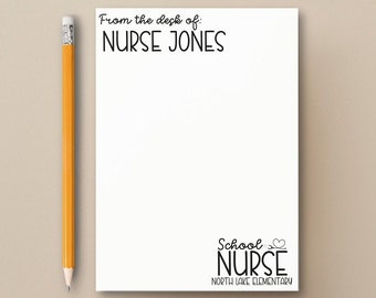 May include: White notepad with black text that reads "From the desk of NURSE JONES" at the top and "School NURSE NORTH LAKE ELEMENTARY" at the bottom.
