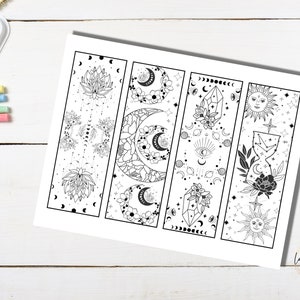 May include: Four printable bookmark designs featuring celestial and floral motifs. Each bookmark is outlined in black and ready to be colored. The designs include a lotus flower, a crescent moon, a crystal, and a sun.