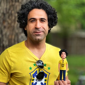 Figura de arcilla polimérica personalizada con cabeza explosiva