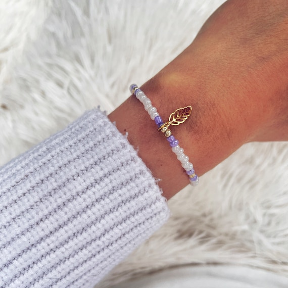 Bracelet, friendship bracelet, white-lilac, adjustable in length, with pendant