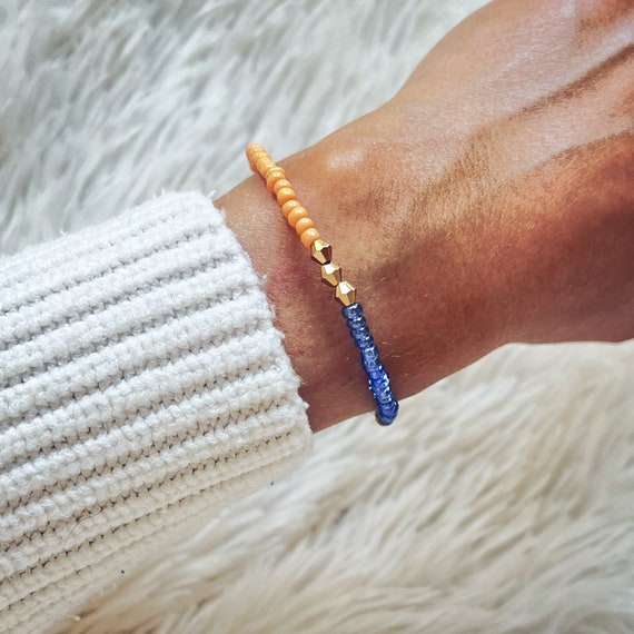 Bracelet, friendship bracelet, tricolor, orange-blue