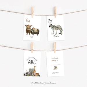 May include: A set of printable alphabet flash cards featuring watercolor illustrations of animals. The cards are designed for children and feature the letters Y and Z, with illustrations of a yak and a zebra. The cards also include a title card that says "Animal Friends Flashcards ABC".