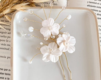 Horquillas de flores para novias: Tocados de novia con perlas