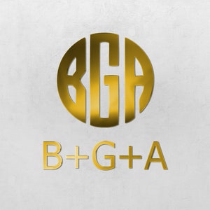 Puede incluir: Un logotipo dorado con las letras B, G y A superpuestas en un círculo. Debajo del círculo, las letras B+G+A están escritas en oro.