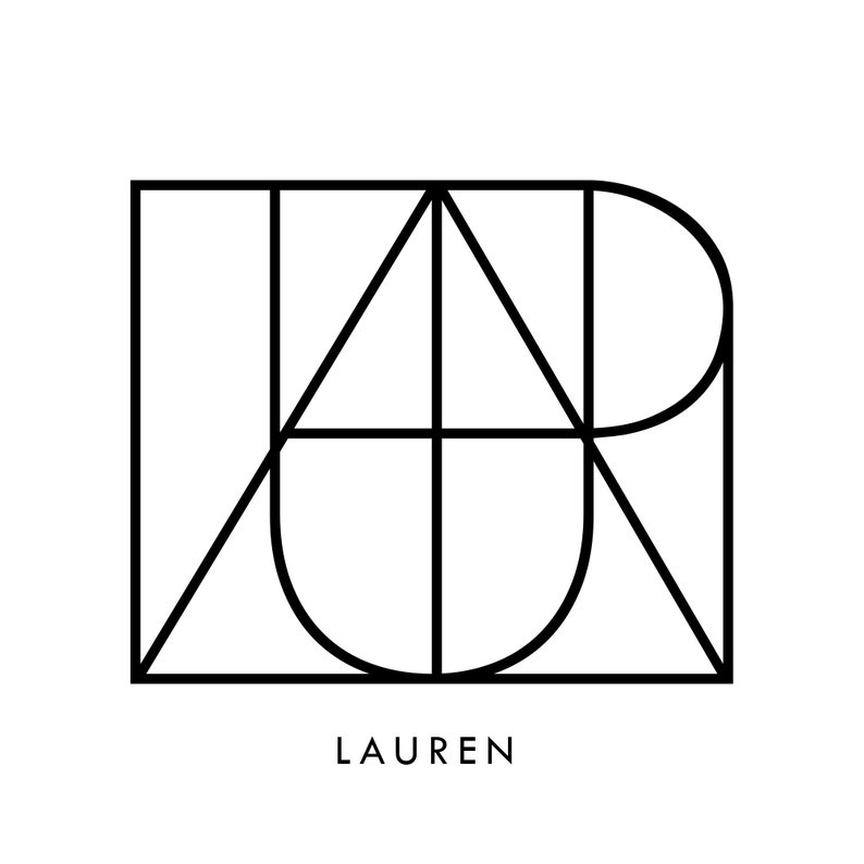 May include: Black and white geometric design with the word "LAUREN" underneath.