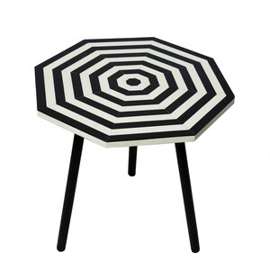 May include: A black and white striped octagonal side table with three black legs.