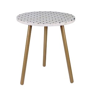May include: A small round side table with a white and black geometric pattern on the top and gold metal legs.