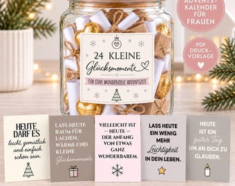 May include: A clear glass jar with a wooden lid filled with rolled paper scrolls and gold-wrapped chocolates. The label reads 24 KLEINE Glücksmomente FÜR EINE WUNDERVOLLE ADVENTSZEIT. Five small cards with German text and holiday icons are displayed in front.