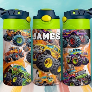 May include: Three water bottles with a colorful monster truck design. The bottles have a green lid and a dark blue handle. The center bottle has the name "JAMES" in white block letters.