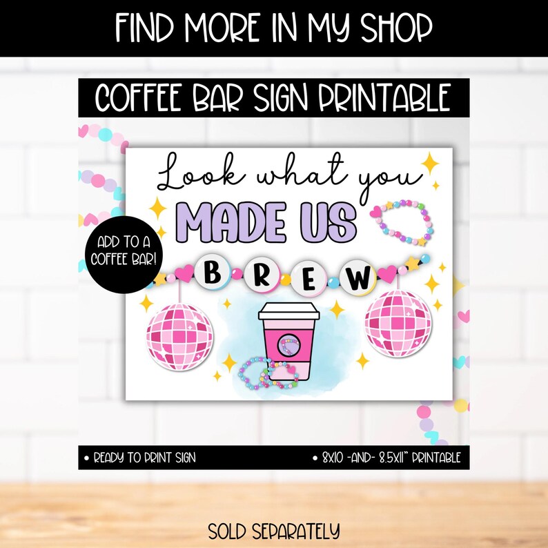 May include: Printable coffee bar sign with the text "Look what you made us brew". The sign features a pink coffee cup, disco balls, and a pink and white beaded necklace.