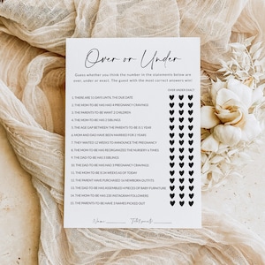 May include: A printable baby shower game called "Over or Under" with 15 questions about the parents-to-be. Each question has a number and players guess if the answer is over, under, or exact.  The game includes a space for the player's name and total points.