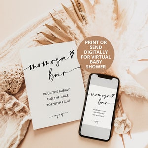 May include: A printable or digital sign for a virtual baby shower, with the text "Mimosa Bar" in black cursive script with a heart. The sign instructs guests to pour the bubbly, add the juice, and top with fruit. The sign is displayed on a white background with a phone showing the same sign.