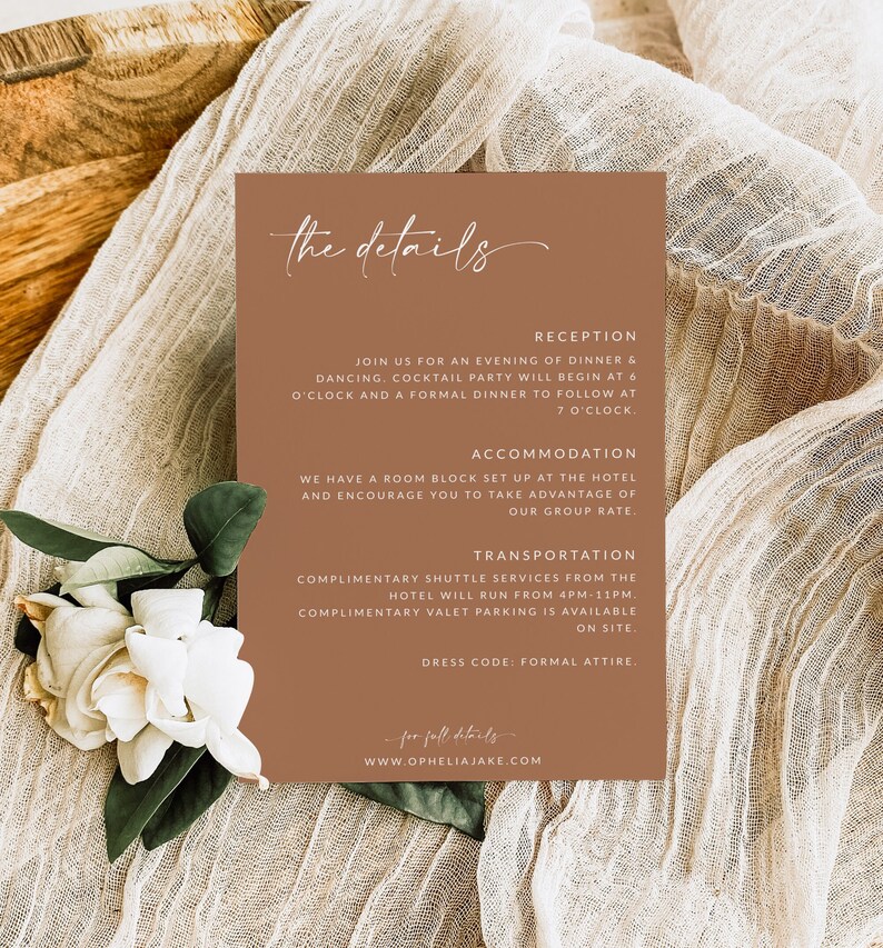 May include: A brown card with white text detailing reception, accommodation, and transportation information for a wedding. The text includes the time of the reception, the hotel where the wedding will be held, and the shuttle service times. The card also includes the website address www.opheliajake.com.
