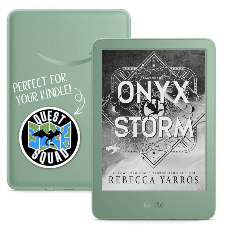 May include: A green Kindle e-reader with a cover that says "PERFECT FOR YOUR KINDLE!" and a sticker of a dragon on a map. The screen shows the cover of the book "ONYX STORM" by Rebecca Yarros.