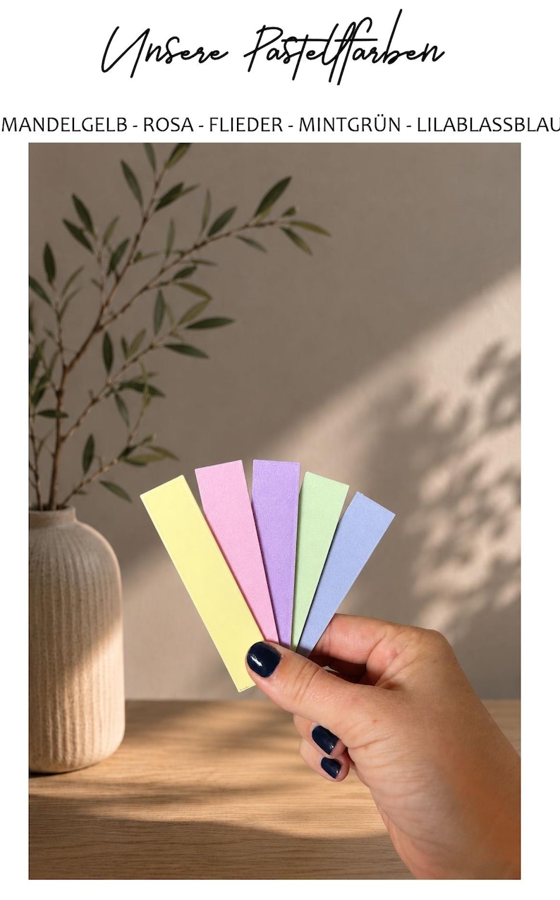 May include: Five rectangular paper strips in pastel colors: almond yellow, pink, lilac, mint green, and pale blue. The text at the top reads: Unsere Pastellfarben. Below, the text lists: MANDELGELB - ROSA - FLIEDER - MINTGR&Uuml;N - LILABLASSBLAU.