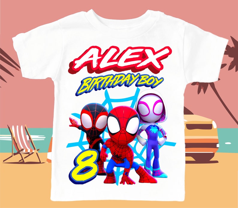 May include: White t-shirt with a Spiderman theme. The shirt features three Spiderman characters, a red and blue Spiderman, a black and red Spiderman, and a white and blue Spiderman. The shirt also has the text "ALEX BIRTHDAY BOY" and the number "8" in yellow.