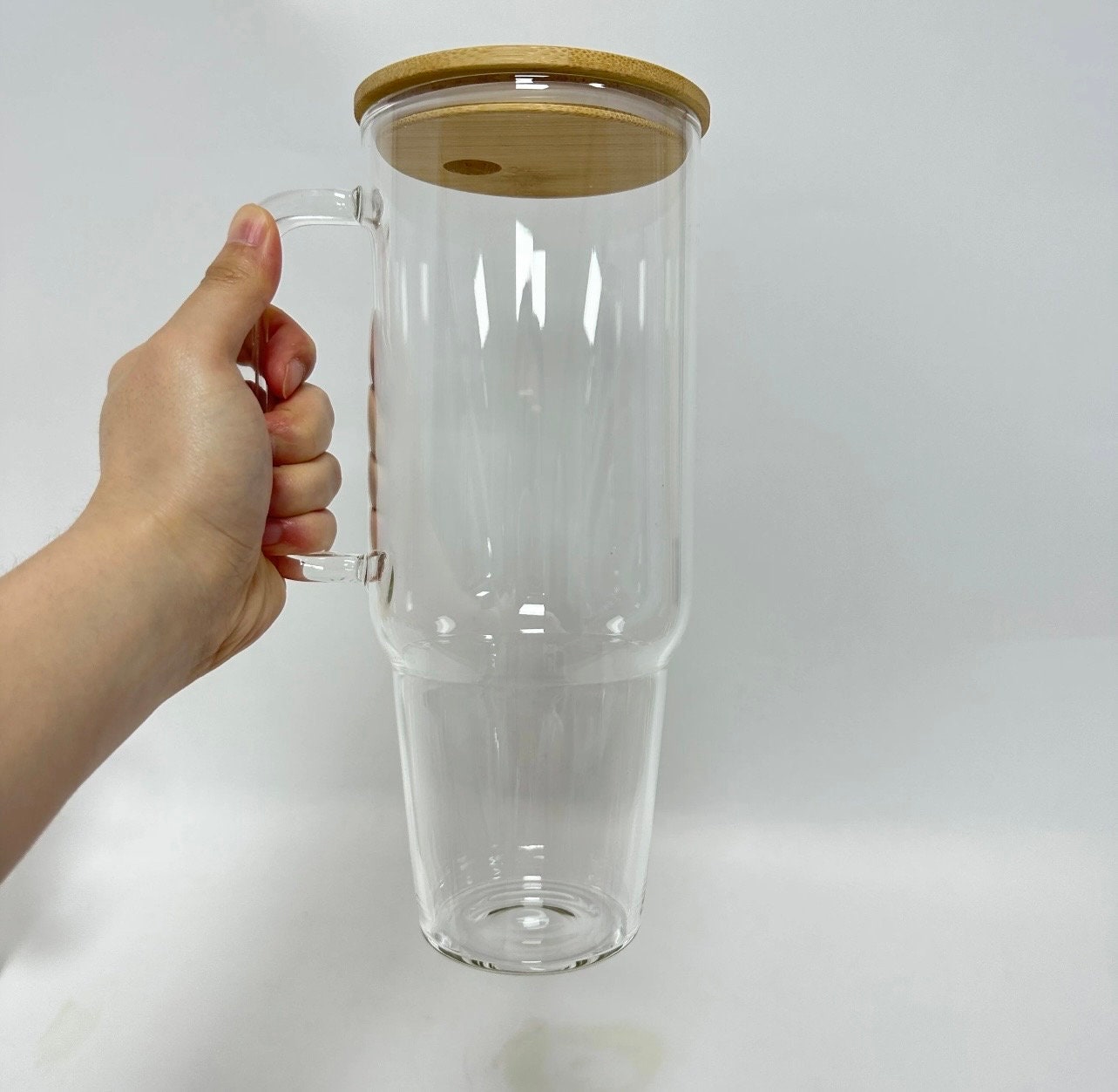 Glass mug on sale with metal handle